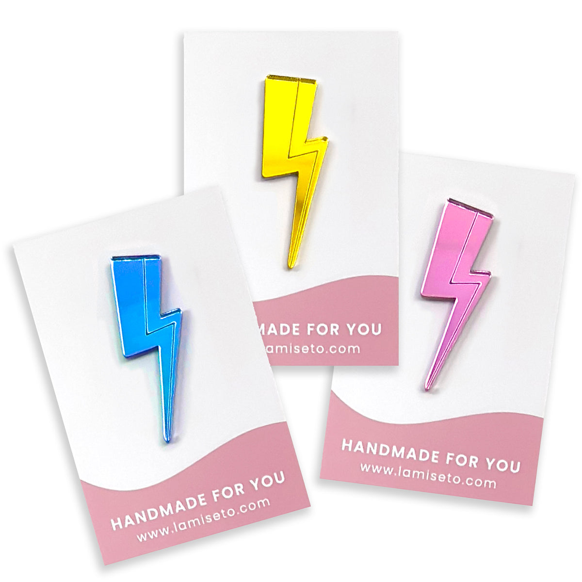 Bliksem pins in geel, blauw en roze