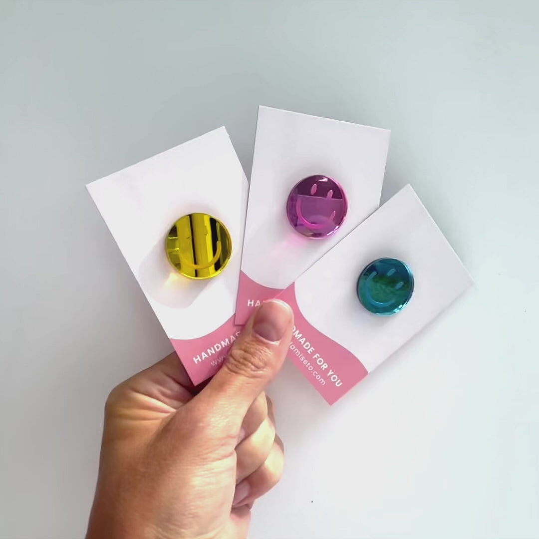 blauwe smiley-smiley geel-smiley-roze smiley-broche