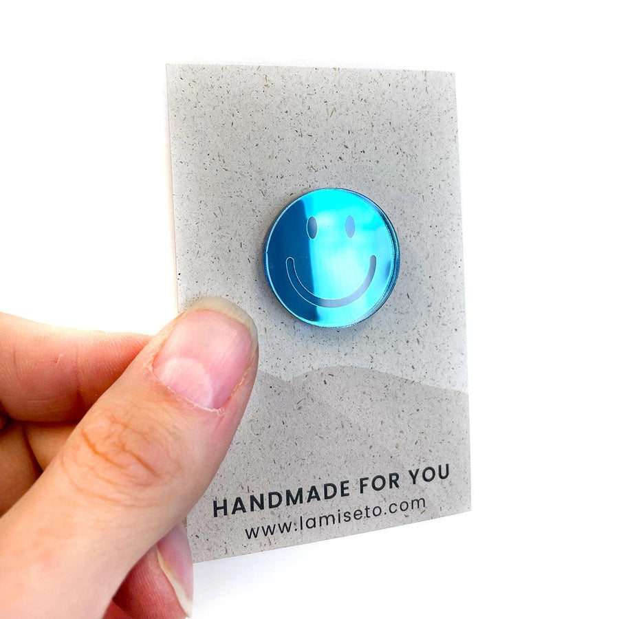 Smiley pin